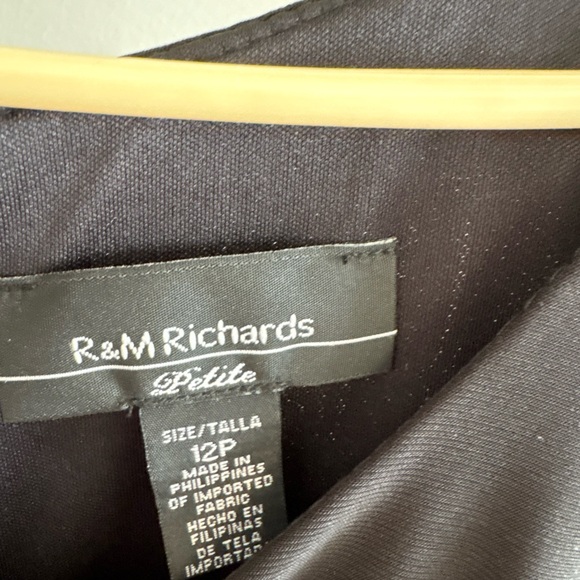 High/low black top with black and pink patterned skirt attached. - Picture 7 of 9